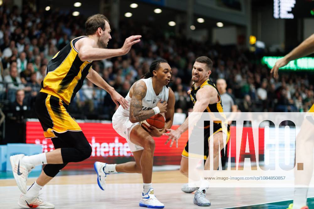 Austin Crowley of the Gladiators Trier in a one-on-one battle with Mindaugas Kacinas of KK Croatia Split and Tonko Vuko of KK Croatia Split; action from the Vet Concept Gladiators Trier vs. KK Split game, basketball, FIBA Europe Cup, Matchday 3, 2026–2027 season, October 21, 2026, Vet Concept Gladiators Trier vs. KK Split, Basketball, FIBA Europe Cup, Matchday 3, 2026–2027 Season