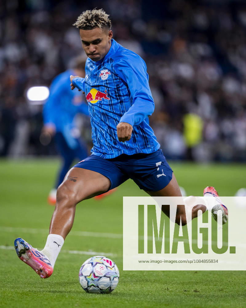 Real Madrid C.F. v RB Leipzig - UEFA Champions League 2026 27 League Phase MD3 MADRID, SPAIN - OCTOBER 21: Antonio Nusa of RB Leipzig warms up prior to the UEFA Champions League 2026 27 League Phase MD3 match between Real Madrid C.F. and RB Leipzig at Estadio Santiago Bernabeu on October 21, 2026 in Madrid, Spain. Madrid Estadio Santiago Bernabeu Madrid Spain
