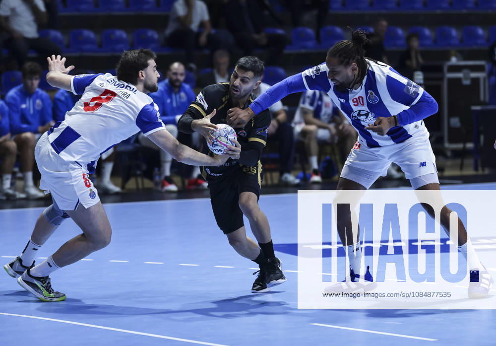 Partizan v Porto - EHF Champions League Yoav Lumbroso (C) of Partizan in action against Moreira de Oliveira, Miguel (L) and Brito Duarte, Gilberto (R) of Porto during the EHF Champions League Season 2026 2027 Group Phase match between RK Partizan v FPorto at Aleksandar Nikolic Hall on October 21, 2026 in Belgrade, Serbia. Belgrade Serbia