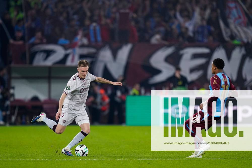 Jordi Altena of Heart of Midlothian (L) and Noah Saviolo of Trabzonspor (R) in action. Trabzonspor v Heart of Midlothian, UEFA Conference League, Football, Papara Park, Trabzon, Turkey - 22 Oct 2026Trabzon Papara Park Turkey