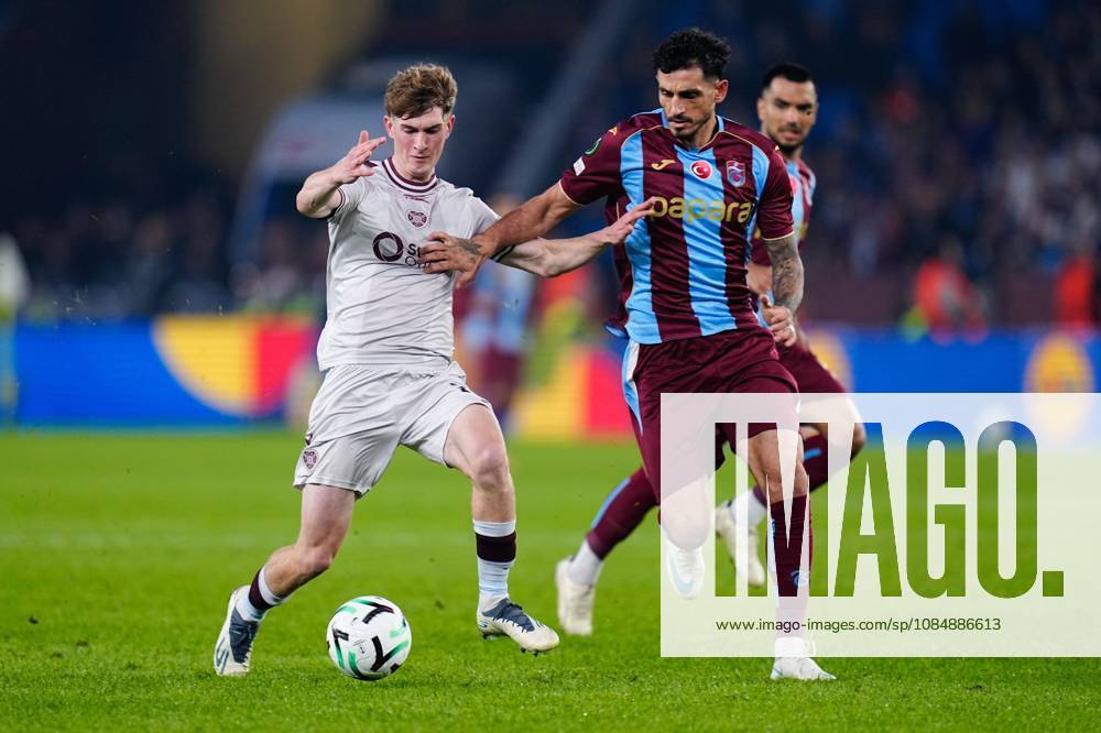 James Wilson of Heart of Midlothian (L) and Samet Akaydin of Trabzonspor (R) in action. Trabzonspor v Heart of Midlothian, UEFA Conference League, Football, Papara Park, Trabzon, Turkey - 22 Oct 2026Trabzon Papara Park Turkey