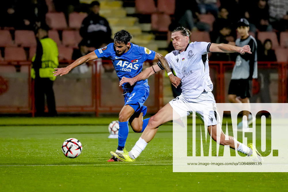 YEREVAN: AZ Alkmaar forward Weslley Patati, FC Ararat Armenia defender Alexandros Malis during the UEFA Europa League match between FC Ararat Armenia and AZ at Vazgen Sargsyan Republican Stadium on October 22, 2026, in Yerevan, Armenia ED VAN DE POL EYE4IMAGES DeFodi Images
