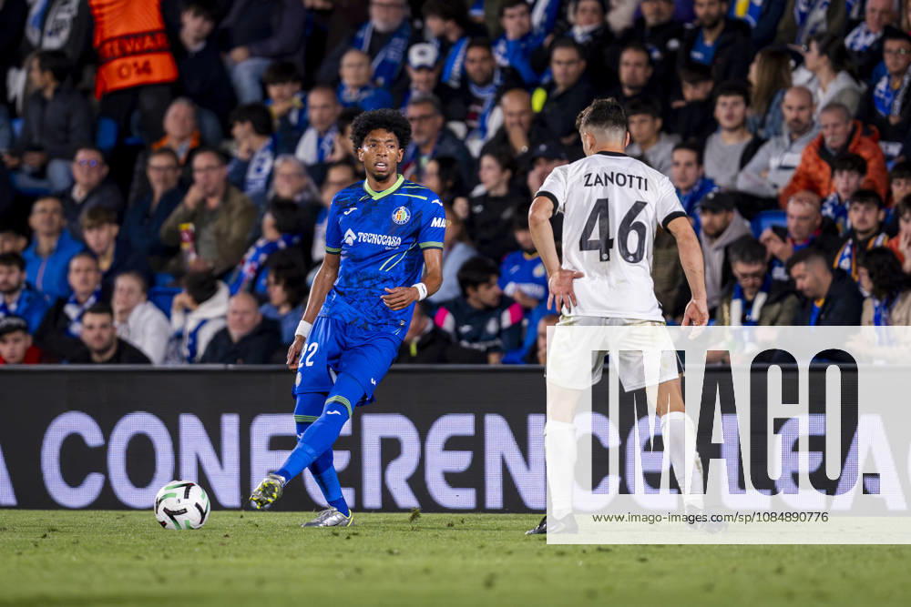 Getafe CF v FC Lugano - UEFA Conference League 2026 27 League Phase MD2 GETAFE, SPAIN - OCTOBER 22: Johan Mojica of Getafe CF (L) passes the ball during the UEFA Conference League 2026 27 League Phase MD2 match between Getafe CF and FC Lugano at Estadio Coliseum on October 22, 2026 in Getafe, Spain. Madrid Estadio Coliseum Madrid Spain