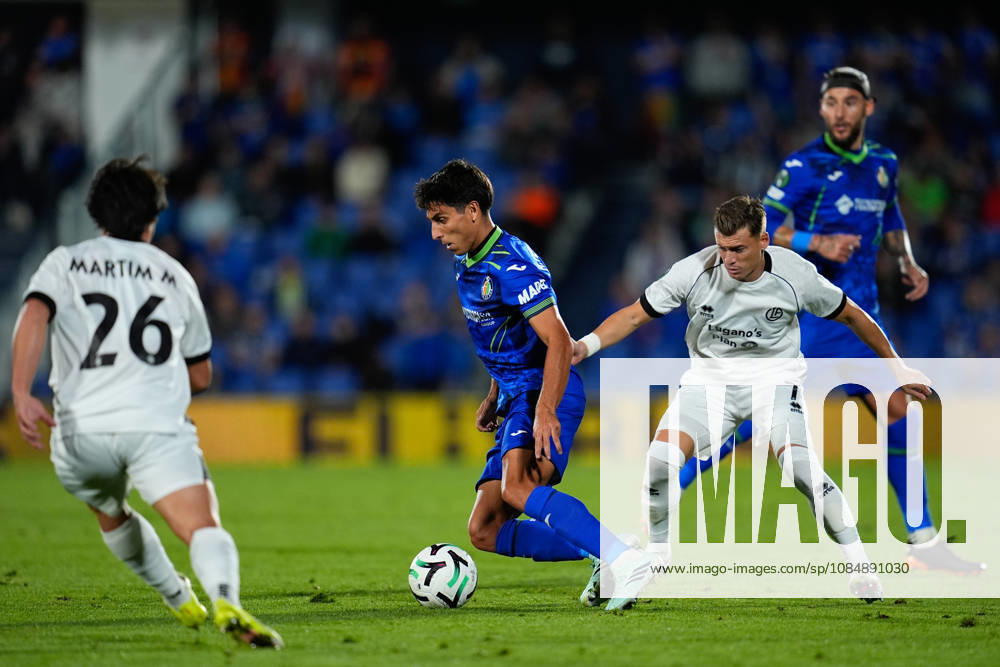 Ramon Terrats of Getafe CF and Ezgjan Alioski of FC Lugano compete for the ball during the UEFA Conference League 2026 27 League Phase MD2 football match between Getafe CF and FC Lugano at Coliseum de Getafe stadium on October 22, 2026, in Getafe, Spain. Getafe Spain - ZUMAa181 20261022_zaa_a181_064