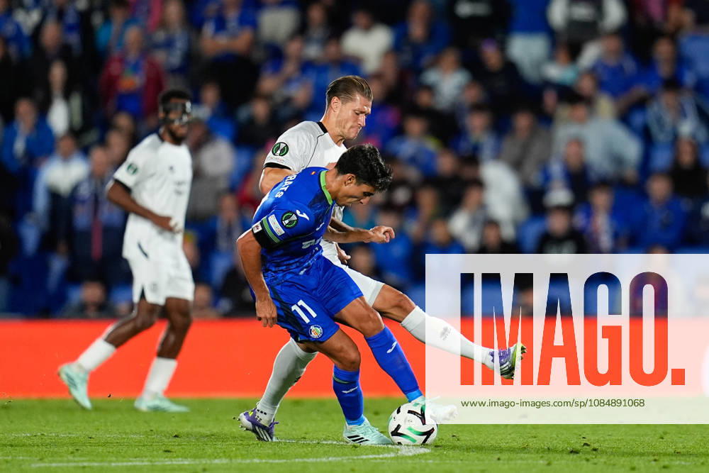 Ramon Terrats of Getafe CF and Kevin Behrens of FC Lugano compete for the ball during the UEFA Conference League 2026 27 League Phase MD2 football match between Getafe CF and FC Lugano at Coliseum de Getafe stadium on October 22, 2026, in Getafe, Spain. Getafe Spain - ZUMAa181 20261022_zaa_a181_067