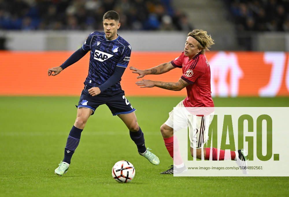 Tackle, Action: Mads Bidstrup (Olympique Lyon 02) vs. Andrej Kramaric (TSG 1899 Hoffenheim) 27 TSG 1899 Hoffenheim vs. Olympique Lyon 22 October 2026 DFL regulations prohibit any use of photographs as IIMAGE SEQUENCES AND OR QUASI-VIDEO TSG 1899 Hoffenheim vs. Olympique Lyon
