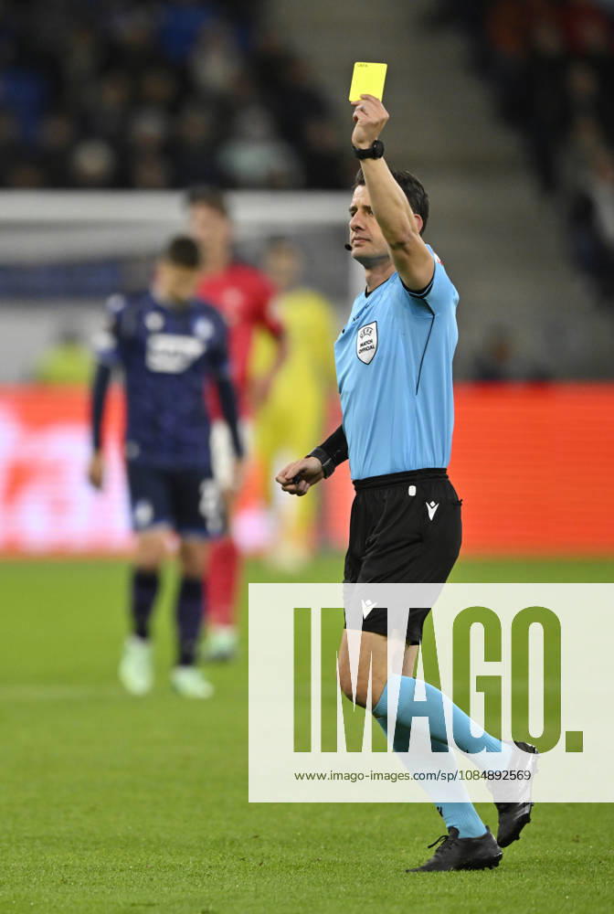 Referee Umut Meler (TUR) shows Mats Rots (TSG 1899 Hoffenheim 39) a yellow card (not shown in the frame) TSG 1899 Hoffenheim vs. Olympique Lyon 22 10 2026 DFL REGULATIONS PROHIBIT ANY USE OF PHOTOGRAPHS AS IMAGE SEQUENCES AND OR QUASI-VIDEO TSG 1899 Hoffenheim vs. Olympique Lyon