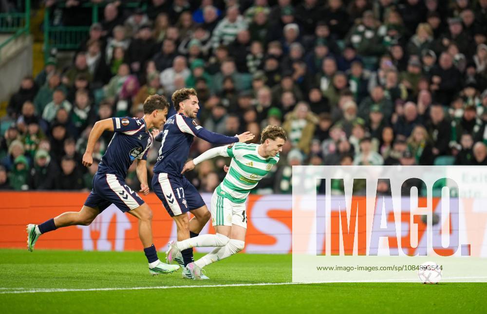 Callum Osmand of Celtic goes to ground under pressure from Sebastian Caceres & Javier Rueda of Celta Vigo Celtic v Celta Vigo, UEFA Europa League, Football, Celtic Park, Glasgow, Scotland, UK - 22 Oct 2026Glasgow Celtic Park Scotland United Kingdom