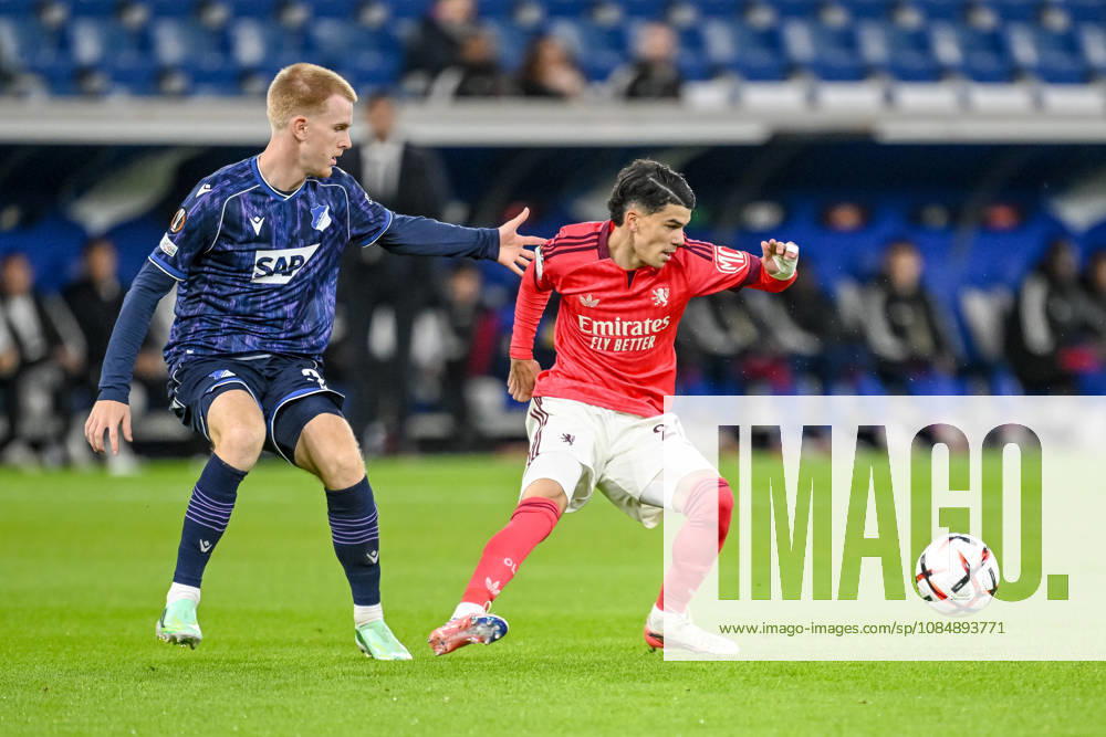 Mats Rots of TSG 1899 Hoffenheim and Kail Boudache of Olympique Lyon battle for the ball during the UEFA Europa League 2026-27 group stage match between TSG 1899 Hoffenheim and Olympique Lyonnais at Rhein-Neckar Arena on October 22, 2026 in Sinsheim, Germany. Photo by Harry Langer, DeFodi Images