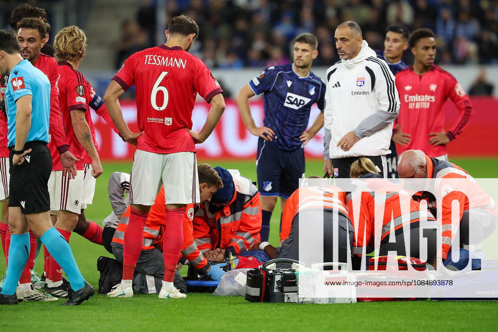 Sinsheim, Germany, October 22, 2026: Steeve Kango of Olympique Lyonnais is being treated for an injury on the field during the UEFA Europa League Matchday 3 game between TSG Hoffenheim and Olympique Lyon at the Rhein-Neckar Arena on October 22, 2026, in Sinsheim, Germany