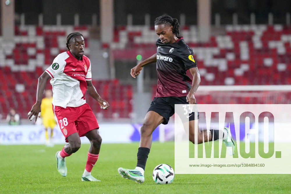 Mamadou Coulibaly (AS Monaco), 28, in a tackle with Jordy Makengo (SC Freiburg), 33, Monaco, soccer, UEFA Conference League, Matchday 2, group stage, 2026–2027, AS Monaco vs. SC Freiburg, October 22, 2026, Stade Louis II, Monaco, Monaco, Stade Louis II, Fontvieille, Monaco