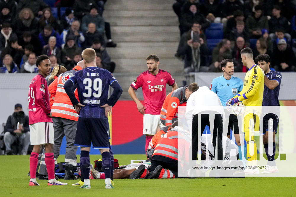 Steeve Kango OL, 37, needs medical attention, injured, injury, sidelined, action, play, game scene, October 22, 2026, Sinsheim, Germany, soccer, UEFA Europa League, TSG 1899 Hoffenheim vs. Olympique Lyon, DFB and DFL regulations prohibit any use of photographs as image sequences and or quasi-video