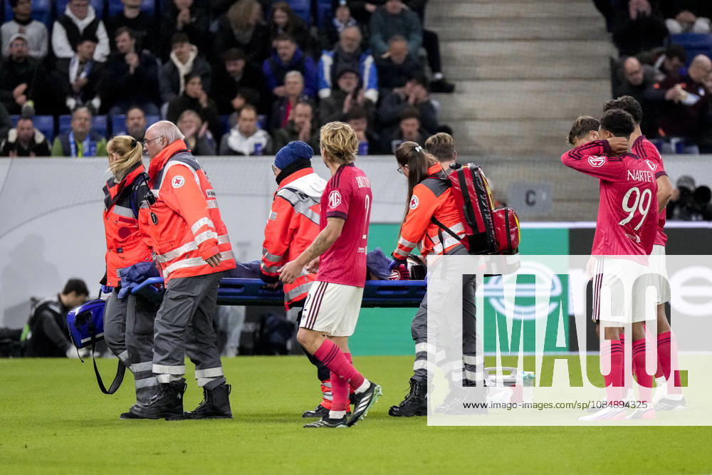 Steeve Kango OL, 37, is carried off the field by paramedics; paramedics on the field with a stretcher; injured; injury; time-out due to injury; action; game scene; October 22, 2026, Sinsheim, Germany, soccer, UEFA Europa League, TSG 1899 Hoffenheim vs. Olympique Lyon, DFB and DFL regulations prohibit any use of photographs as image sequences and or quasi-video