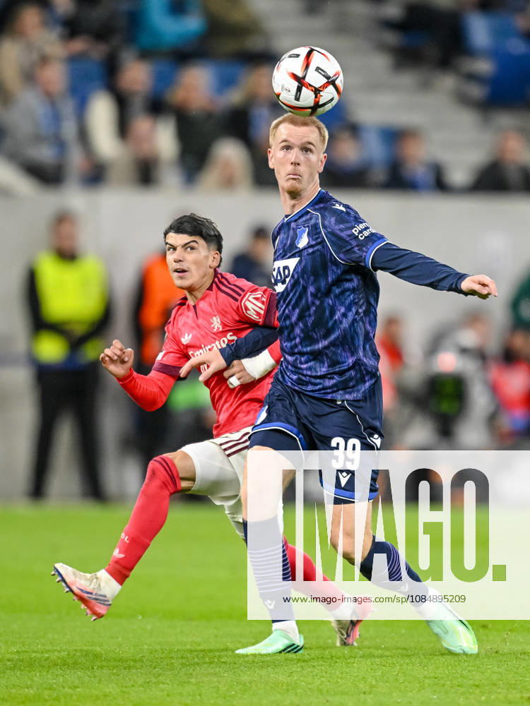 Kail Boudache of Olympique Lyon and Mats Rots of TSG 1899 Hoffenheim battle for the ball during the UEFA Europa League 2026–27 group stage match between TSG 1899 Hoffenheim and Olympique Lyonnais at Rhein-Neckar-Arena on October 22, 2026 in Sinsheim, Germany. Photo by Harry Langer, DeFodi Images