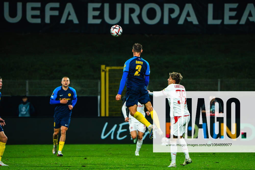 Pijus Sirvys of Celje (C) in action against Jesper Lindstrom of Salzburg (R) during the UEFA Europa League match between Celje (Slovenia) and Salzburg (Austria) at Stadion Celje, Celje on October 22, 2026 in Celje, Slovenia. (Photo by Andraz Corel Sports Press Photo).