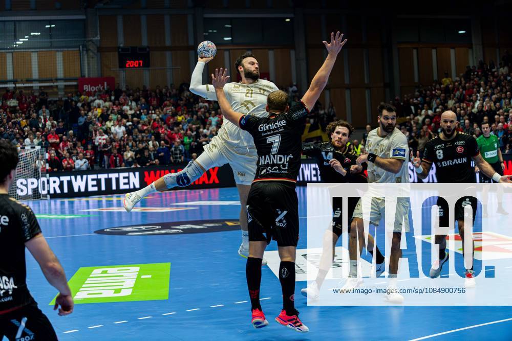 EHF Champions League 2026–2027 Group Stage Group B Match 5 MT Melsungen vs. Orlen Wisla Plock Pictured, from left, in a one-on-one battle: Zoltan Szita, Zoltan Szita (SPR), and David Mandic Mandic, MT Rothenbach, Halle, Hesse
