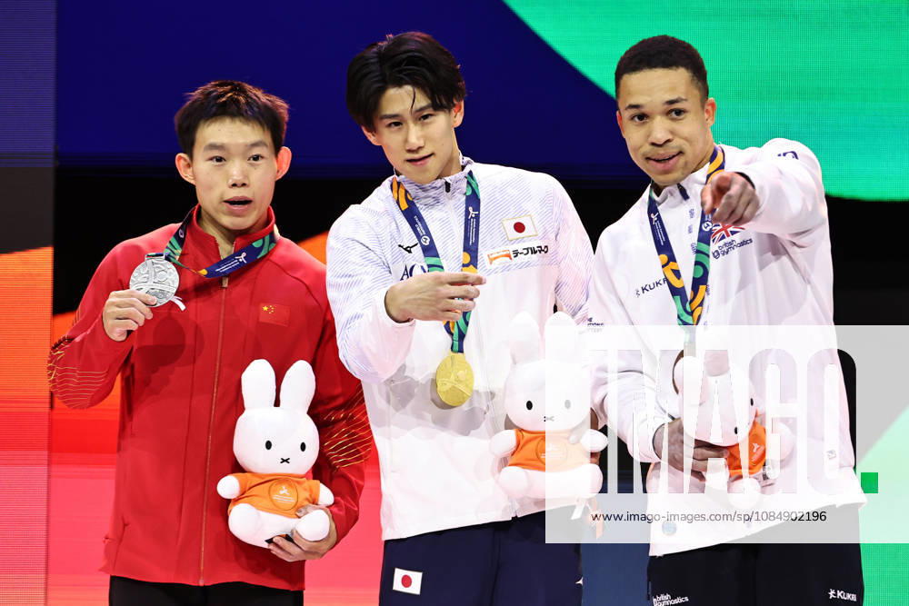 Winners Yang Haonan (CHN), Daiki Hashimoto (JPN), and Joe Fraser (GBR) after the all-around final at the 2026 World Championships in Rotterdam on October 22, 2026