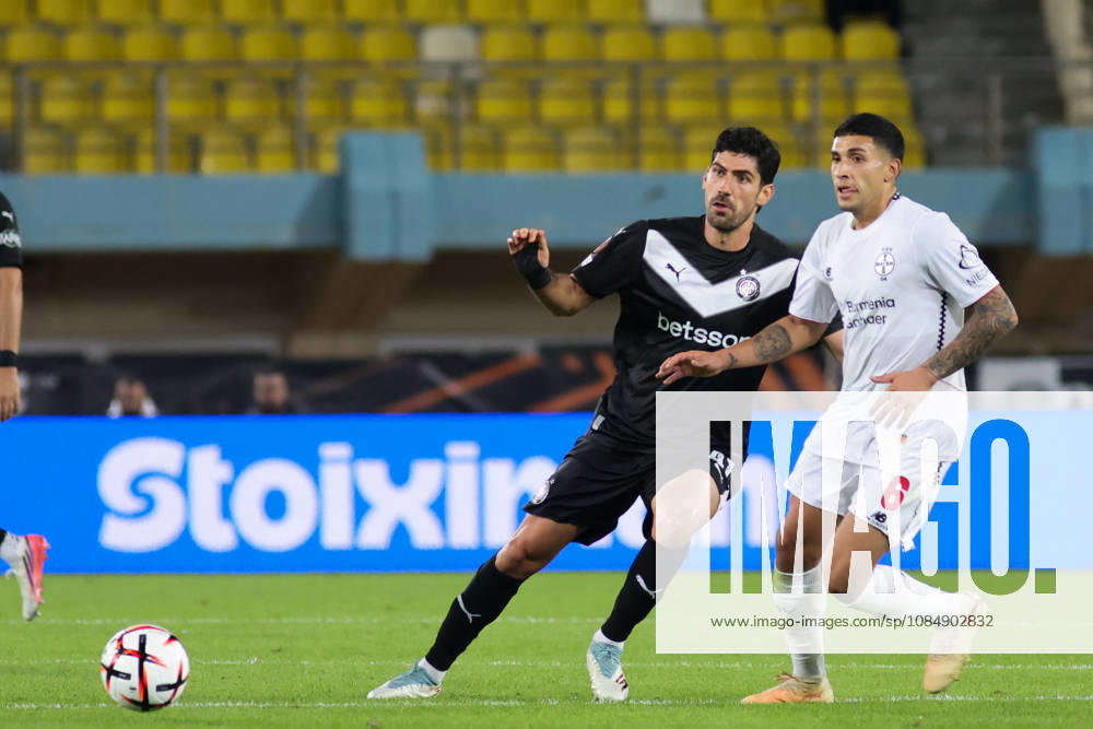 UEFA Europa League - OFI Crete vs Leverkusen - Andreas Bouchalakis of OFI Crete in action against qui Fernandez of Leverkusen during the UEFA Europa League phase Matchday 3 soccer match between OFI Crete vs Leverkusen in Pankritio, Heraklion, Greece, on 22 October 2026. IMAGO ONE INCH PRODUCTIONS Heraklion Greece