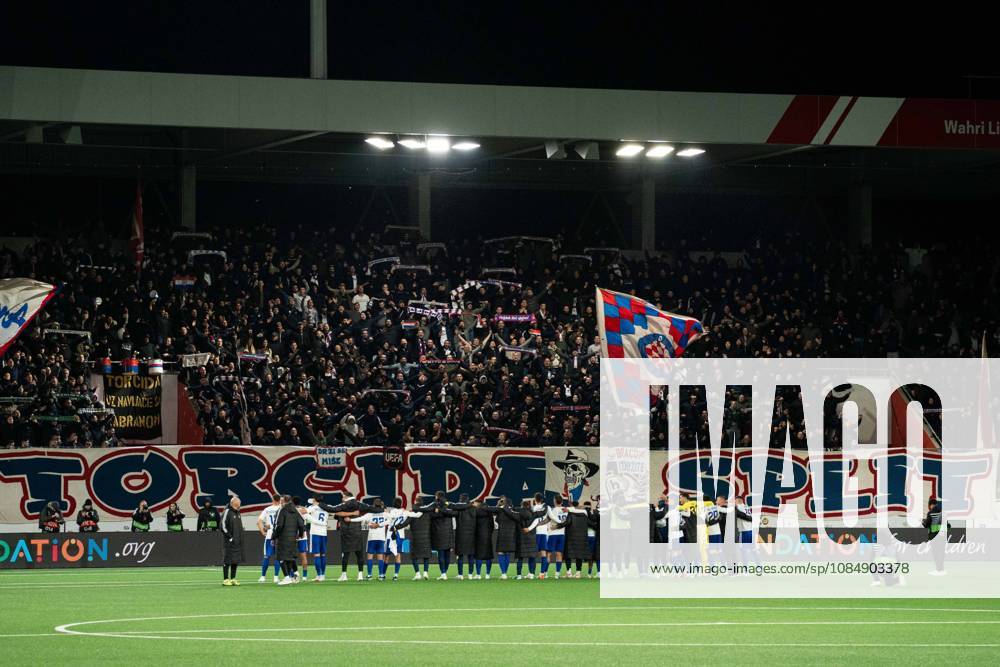 THUN, BERN - OCTOBER 22: Fans of HNK Hajduk Split celebrate their players after the victory in the UEFA Conference League match between FC Thun and HNK Hajduk Split at VISANA STADION on October 22, 2026 in Thun, Bern, Switzerland.