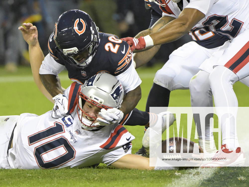 New England Patriots quarterback Drake Maye (10) reaches over the goal line for a second quarter touchdown against the Chicago Bears at Soldier Field in Chicago on Thursday, October 22, 2026. CHI20261022104r MARKxBLACK