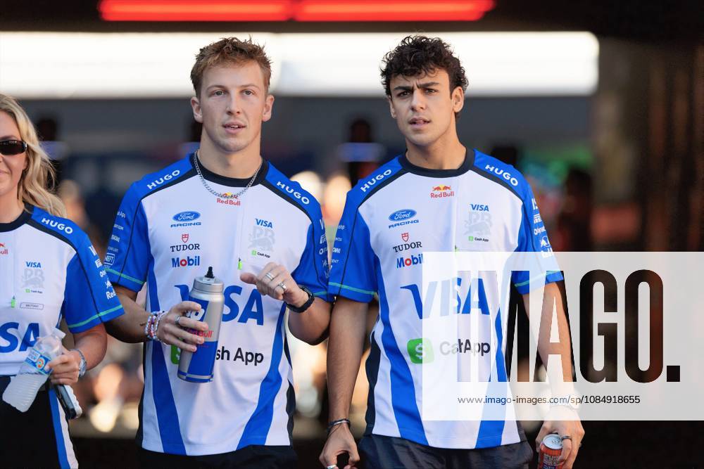 23rd October 2026; Circuit of the Americas, Austin, United States; Formula 1, United States Grand Prix, Free Practice Day; Liam Lawson (30) of New Zealand and Visa Cash App Racing Bulls Formula One Team and Arvid Lindblad (41) of Great Britain and Visa Cash App Racing Bulls Formula One Team walk out of the paddock BobxKupbens