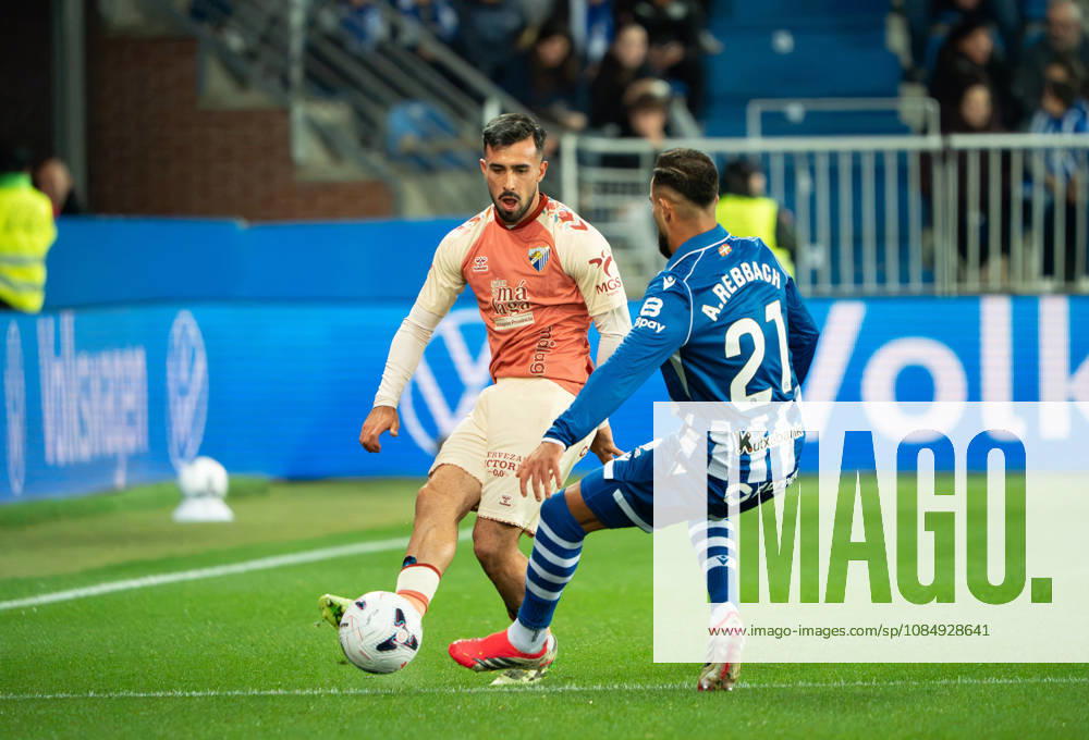 ESP LaLiga EA Sports Deportivo Alavés vs. Málaga CF: Carlos Puga of Málaga and Abderrahmane Rebbach of Alavés during the LaLiga EA Sports match between Deportivo Alavés and Málaga CF, played at Mendizorroza Stadium in Vitoria-Gasteiz on October 23, 2026 in Spain VITORIA GASTEIZ Spain Soccer