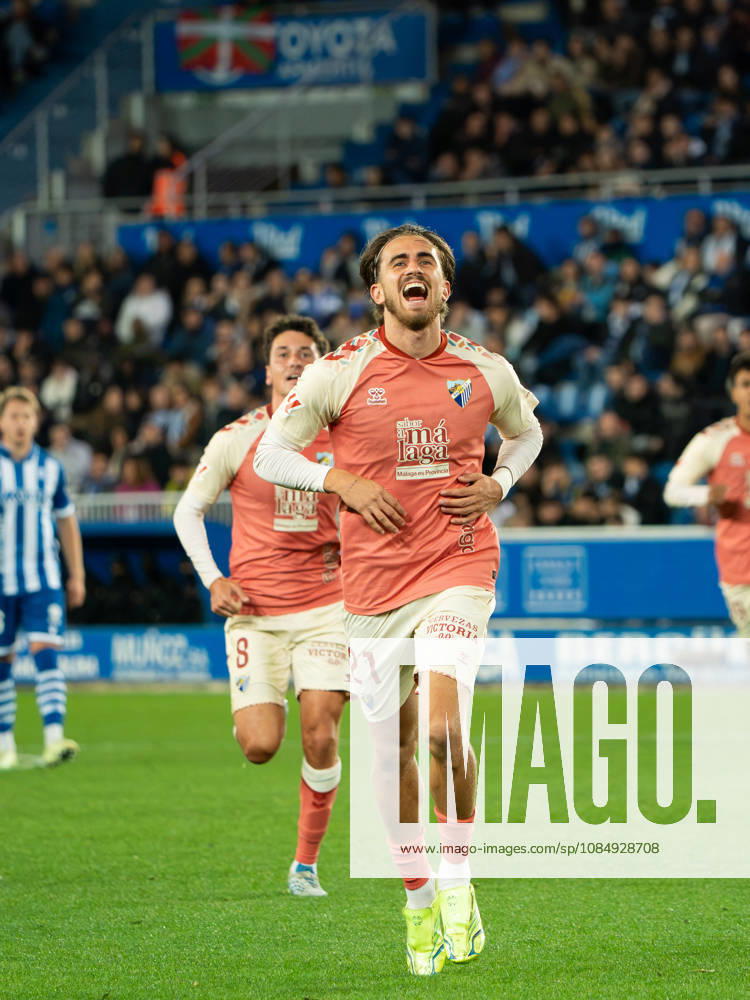 ESP LaLiga EA Sports: Deportivo Alavés vs. Málaga CF — Adrián Nino of Málaga scores a goal and celebrates during the LaLiga EA Sports match between Deportivo Alavés and Málaga CF, played at Mendizorroza Stadium in Vitoria-Gasteiz on October 23, 2026, in Spain. VITORIA-GASTEIZ, Spain — Soccer