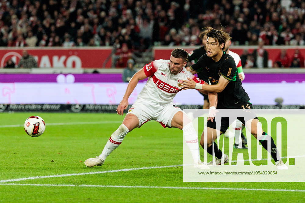 Ermedin Demirovic (VfB Stuttgart, 9) controls the ball against Daiki Hashioka (Borussia Moenchengladbach, 14) during the Bundesliga match between VfB Stuttgart vs. Borussia Moenchengladbach at MHP Arena on matchday 7 of the 1. Bundesliga on October 23, 2026 in Stuttgart, Germany. DFL REGULATIONS PROHIBIT ANY USE OF PHOTOGRAPHS AS IMAGE SEQUENCES AND OR QUASI-VIDEO. Baden-Wuerttemberg Germany