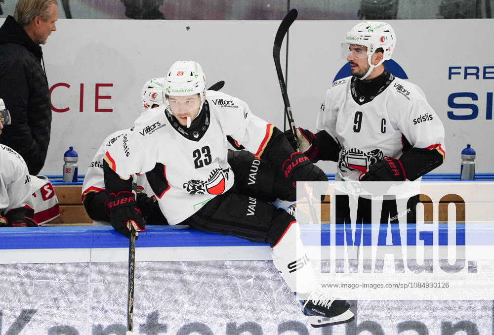 Zug, Switzerland—Men s Ice Hockey, 2026–2027 Season, EV Zug vs. HC Lausanne. Photo: Philipp Kurashev (right) and Damien Riat, both of HC Lausanne, in action.