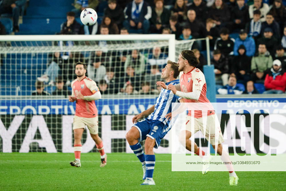 ESP LaLiga EA Sports: Deportivo Alavés vs. Málaga CF — Pablo Ibánez of Alavés and Adrián Nino of Málaga during the LaLiga EA Sports match between Deportivo Alavés and Málaga CF, played at Mendizorroza Stadium in Vitoria-Gasteiz on October 23, 2026 in Spain VITORIA GASTEIZ Spain Soccer
