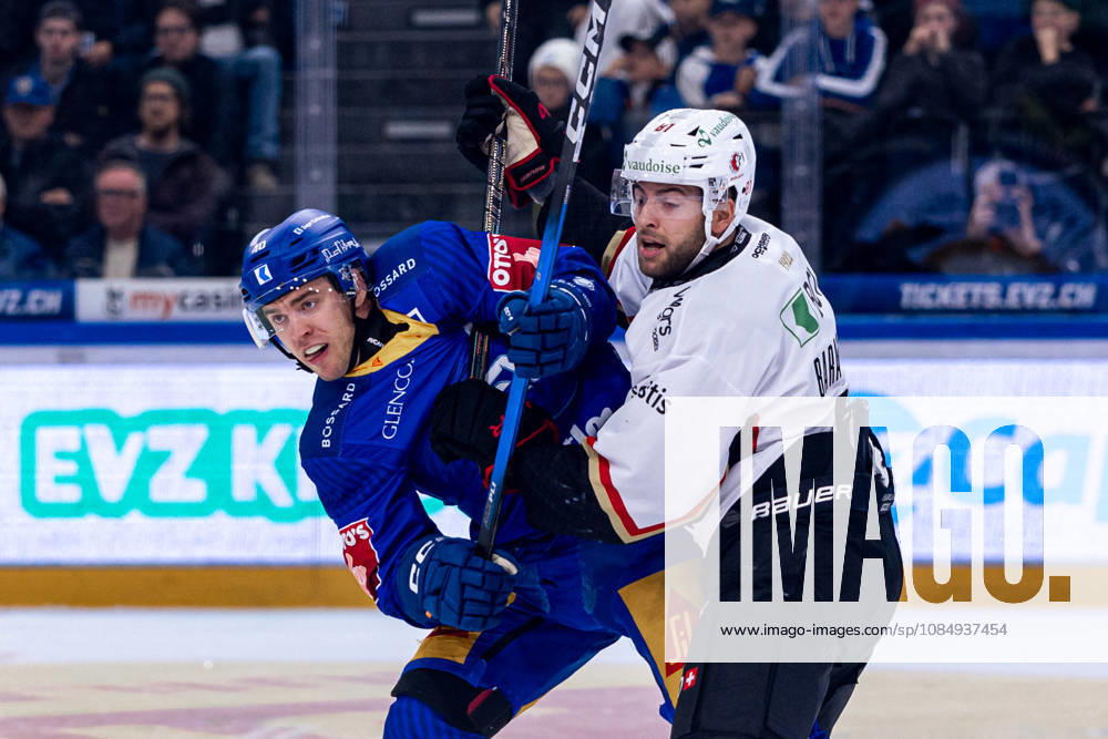 Andreas Wingerli 40 (EV Zug) and Inaki Baragano 81 (Lausanne HC) 23 10 2026 National League, Regular Season, Ice Hockey, OYM Hall, Zug EV Zug Lausanne HC Image by