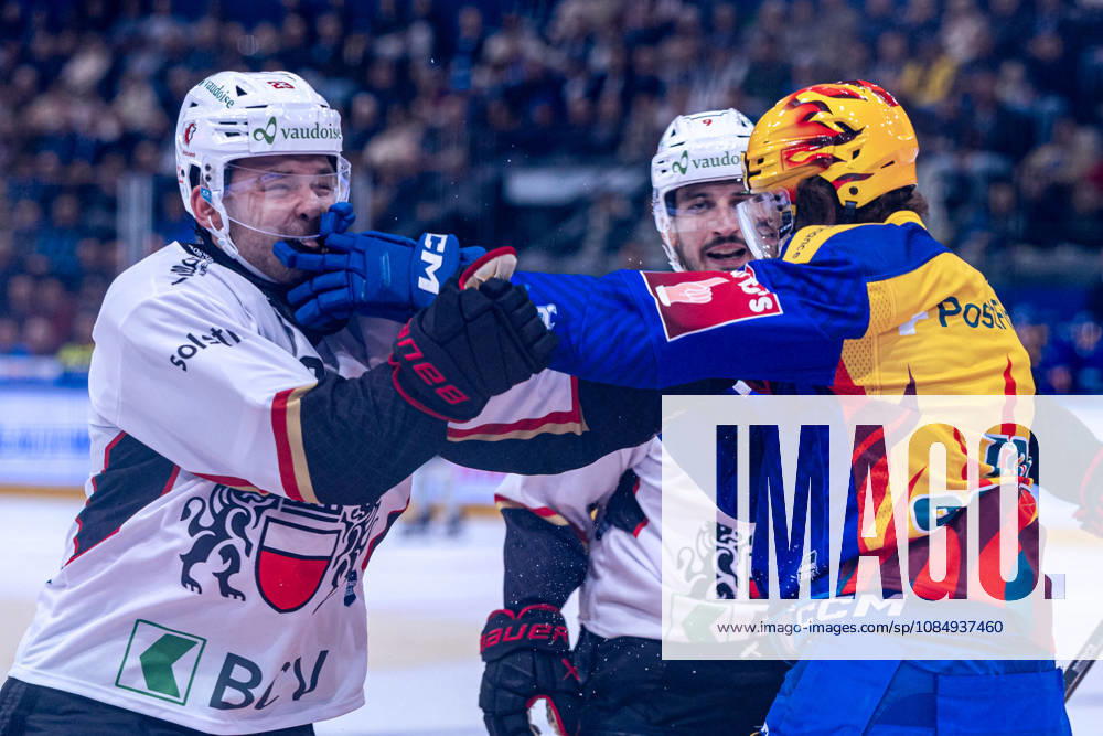 Philipp Kurashev, 23, of Lausanne HC, charges at the offender, top scorer Vinzenz Rohrer of EV Zug, after a check. October 23, 2026. National League, Regular Season, Ice Hockey, OYM Hall, Zug. EV Zug vs. Lausanne HC. Image by