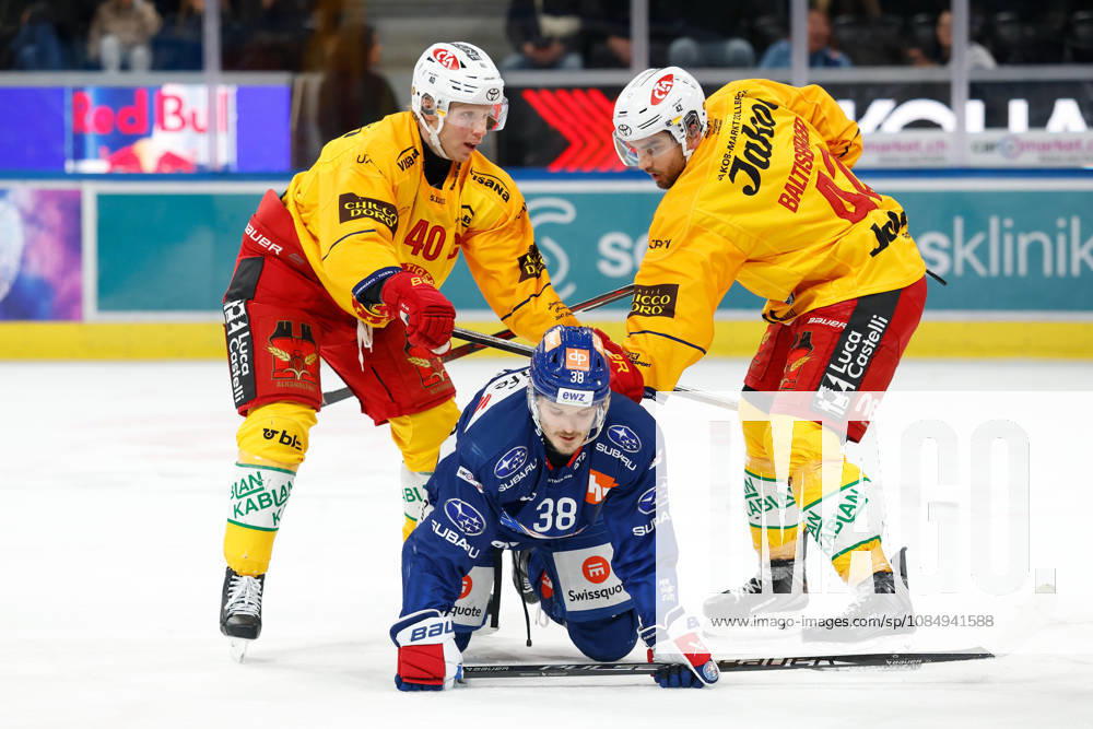 Swiss Life Arena, Zurich, SWITZERLAND, 2026–2027 Season, Men s Ice Hockey National League: ZSC Lions vs. SCL Tigers; Flavio Schmutz (L) and Phil Baltisberger (SCL Tigers) vs. Rudolfs Balcers (ZSC Lions)