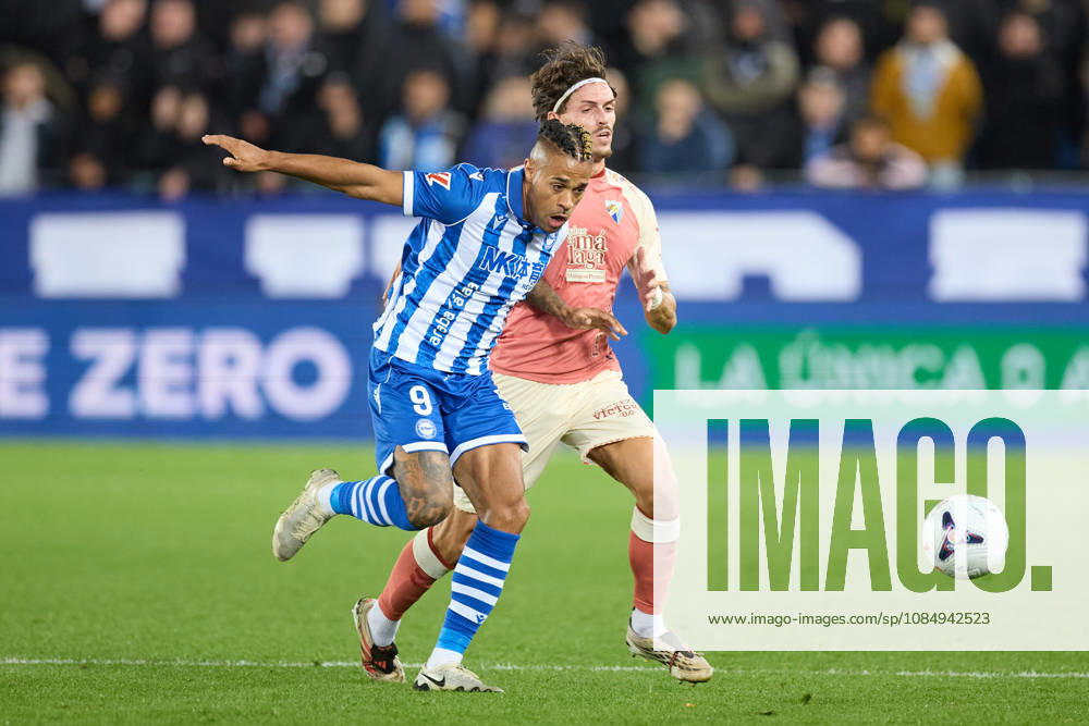Deportivo Alaves v Malaga CF - LaLiga EA Sports Mariano Diaz Mejia of Deportivo Alaves competes for the ball with Angel Recio of Malaga CF during the LaLiga EA Sports match between Deportivo Alaves and Malaga CF at Mendizorrotza on October 23, 2026, in Vitoria, Spain. Vitoria Mendizorrotza Basque Country Spain RL_DALVvMCF_2K26_0029