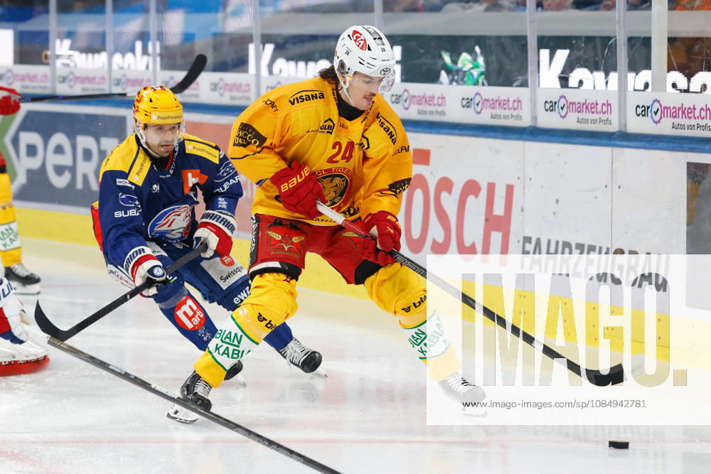 Swiss Life Arena, Zurich, SWITZERLAND, 2026–2027 Season, Men s Ice Hockey National League: ZSC Lions vs. SCL Tigers—Denis Malgin (ZSC Lions) vs. Noah Meier (SCL Tigers)