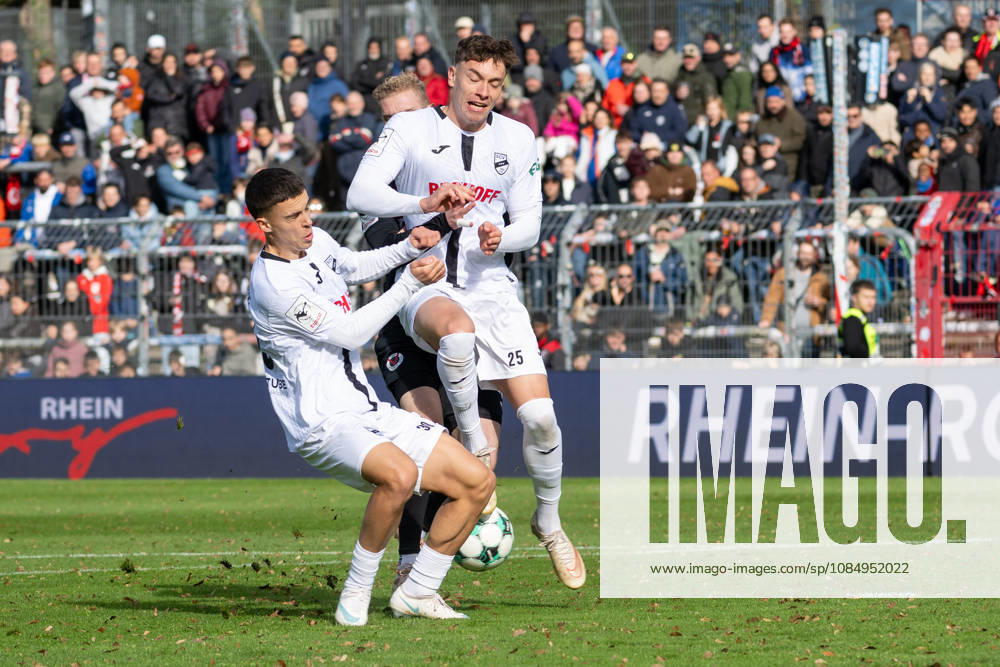 Collision between Almin Mesanovic (Sportclub Verl, 30) and Tim Heike (Sportclub Verl, 25). Behind them is Meiko Sponsel (Viktoria Cologne, 19). FC Viktoria Cologne vs. SC Verl, soccer, 3rd Division, Matchday 11, 2026–2027 season, October 24, 2026 DFL DFB regulations prohibit any use of photographs as image sequences and or quasi-video FC Viktoria Cologne vs. SC Verl, soccer, 3rd Division, Matchday 11, 2026–2027 season, October 24, 2026, Cologne
