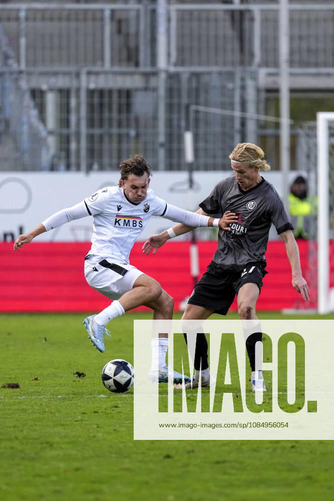 From left: Florian Engelhardt (SVS), 12, Vico Meien (Aalen), 27, tackle, game scene, duel, tackle, tackling, dynamic, action, 10 24 2026, Sandhausen, Germany, soccer, Regionalliga Southwest, SV Sandhausen vs. VfR Aalen