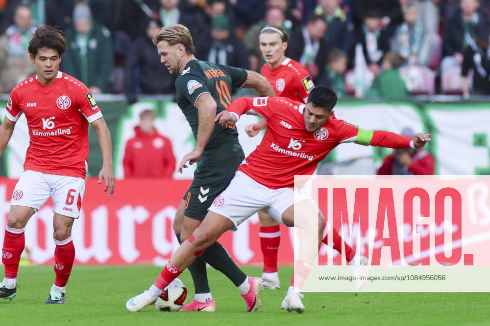 Niclas Fuellkrug of Werder Bremen and Nadiem Amiri of 1. FSV Mainz 05 battle for the ball during the Bundesliga match between 1. FSV Mainz 05 and SV Werder Bremen at the MEWA Arena on October 24, 2026, in Mainz, Germany. Photo by Marco Steinbrenner, DeFodi Images. Niclas Fuellkrug of Werder Bremen and Nadiem Amiri of 1. FSV Mainz 05 battle for the ball during the Bundesliga match between 1. FSV Mainz 05 and SV Werder Bremen at MEWA Arena on October 24, 2026 in Mainz, Germany. Photo by Marco Steinbrenner, DeFodi Images. DFB and DFL regulations prohibit any use of photographs as image sequences and or quasi-video. Photo by Marco Steinbrenner, DeFodi Images