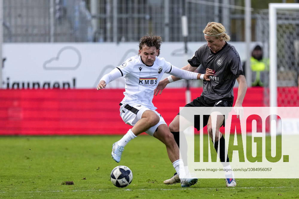 From left: Florian Engelhardt (SVS), 12, Vico Meien (Aalen), 27, tackle, game scene, duel, tackle, tackling, dynamic, action, 10 24 2026, Sandhausen, Germany, soccer, Regionalliga Southwest, SV Sandhausen vs. VfR Aalen