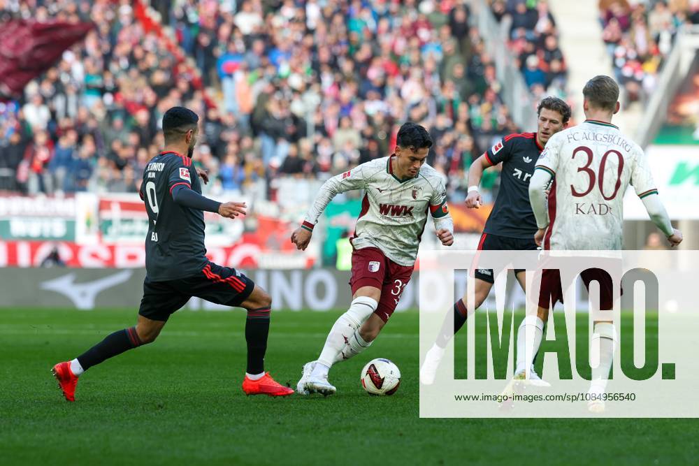 One-on-one, action, featuring Livan Burcu 9 (1. FC Union Berlin) and Fabian Rieder 32 (FC Augsburg), FC Augsburg vs. 1. FC Union Berlin, soccer, 1st Bundesliga, Matchday 7, October 24, 2026. DFB and DFL regulations prohibit any use of photographs as image sequences and or quasi-video. Augsburg, Bavaria, Germany