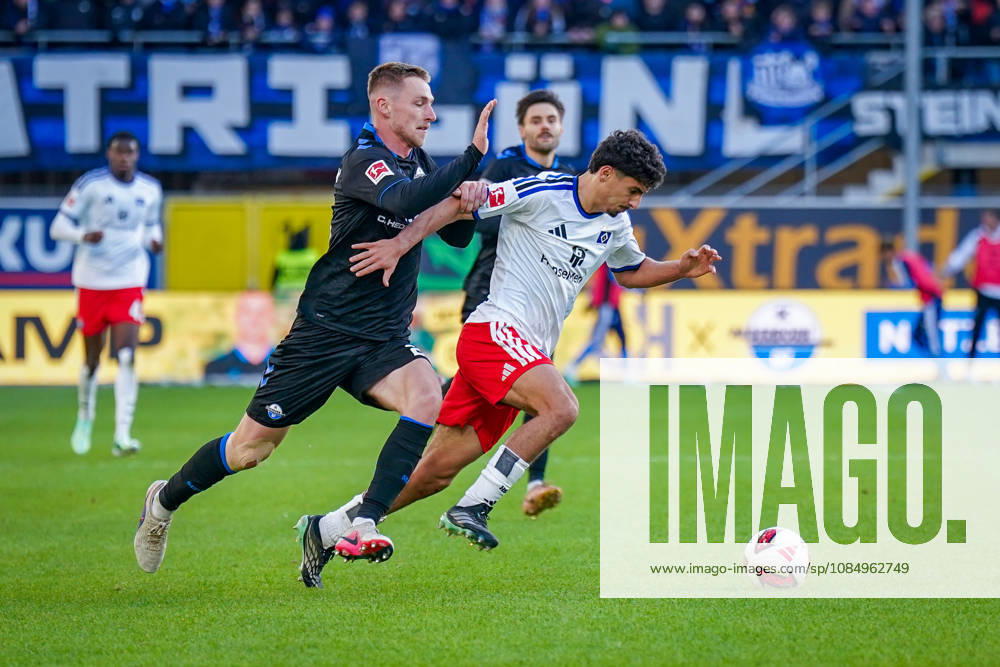 German Soccer Bundesliga 2026–2027, Matchday 7: SC Paderborn vs. Hamburger SV at Home Deluxe Arena in Paderborn; Martin Adeline (Hamburger SV) and Tjark Scheller (Paderborn) in a tackle, 25