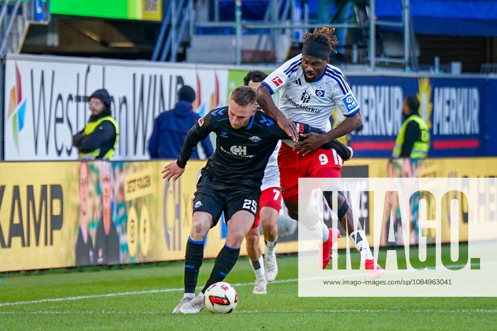 German Soccer Bundesliga 2026–2027, Matchday 7: SC Paderborn vs. Hamburger SV at Home Deluxe Arena, Paderborn; Tjark Scheller (Paderborn) and Terem Moffi (Hamburger SV), No. 9, in a tackle