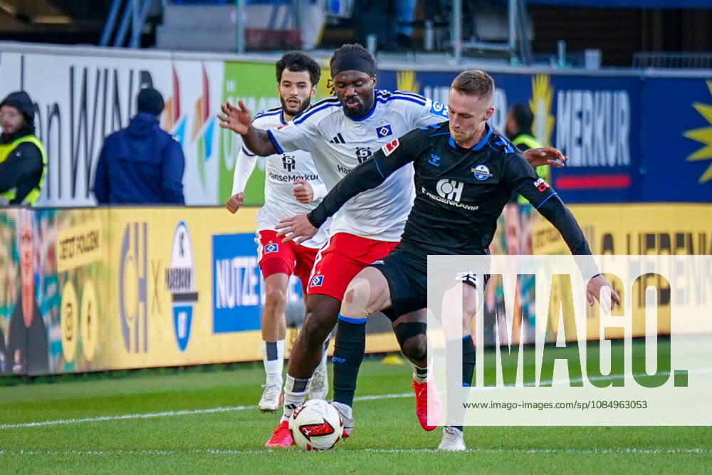 German Soccer Bundesliga 2026–2027, Matchday 7: SC Paderborn vs. Hamburger SV at Home Deluxe Arena, Paderborn; Tjark Scheller (Paderborn) and Terem Moffi (Hamburger SV), No. 9, in a tackle