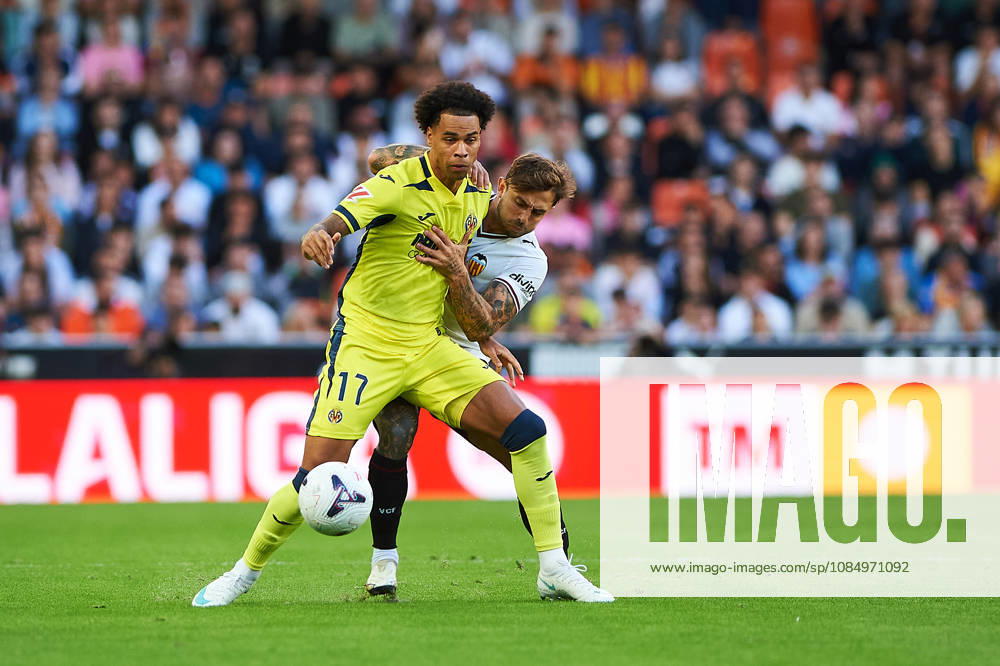 Pablo Maffeo of Valencia CF and Tajon Buchanan of Villarreal CF during the LaLiga EA Sports match between Valencia CF and Villarreal CF at Mestalla on October 24, 2026, in Valencia, Spain