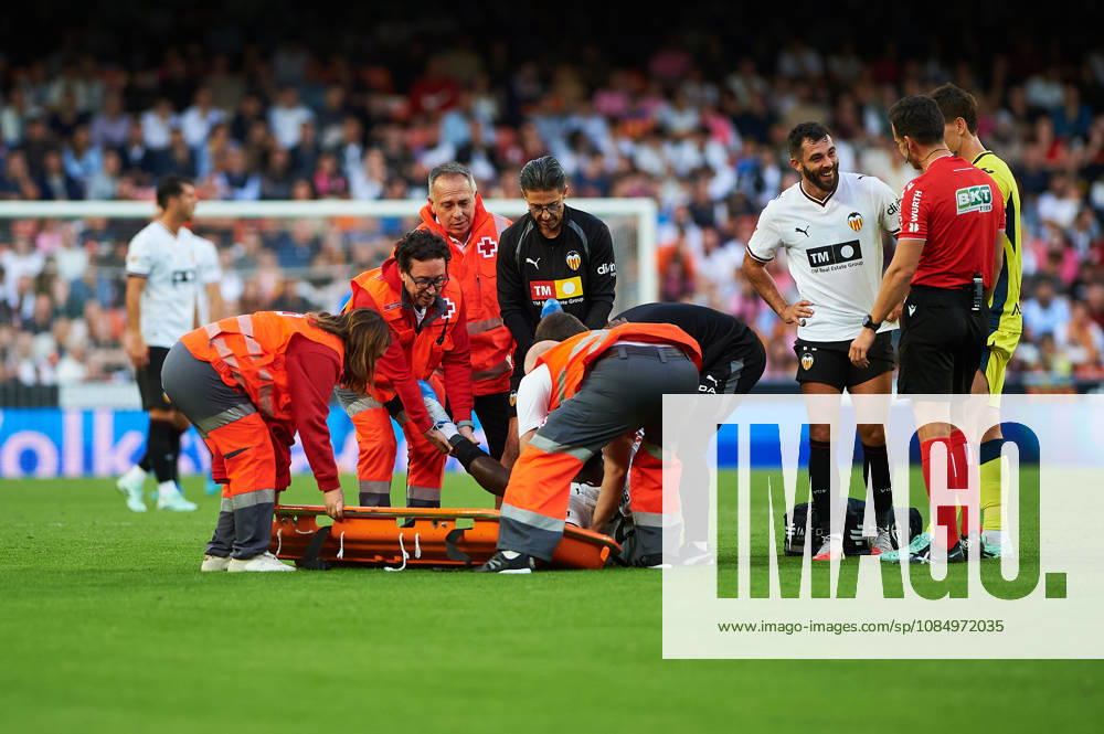 David Otorbi of Valencia CF is injured during the LaLiga EA Sports match between Valencia CF and Villarreal CF at Mestalla on October 24, 2026, in Valencia, Spain