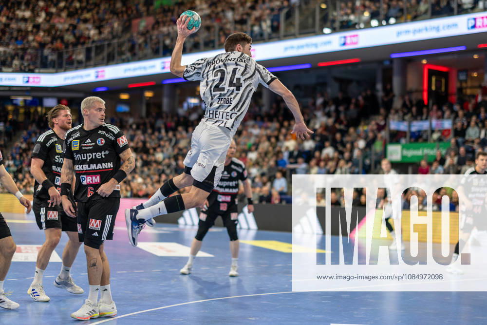 Lukas Zerbe, THW Kiel, 24, taking a shot; Marek Nissen, HC Erlangen, 06 GER; HC Erlangen vs. THW Kiel, handball, Opel Handball Bundesliga, Matchday 10, 2026–2027 season, October 24, 2026, GER, HC Erlangen vs. THW Kiel, Handball, Opel Handball Bundesliga, Matchday 10, 2026–2027 season, October 24, 2026, Nuremberg