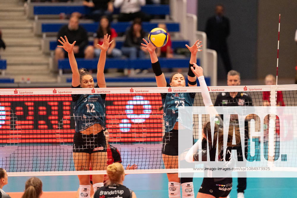 Pictured: Block by Mette Marleen Pfeffer (12), Dresdner SC, and Mackenzie Foley (23), Dresdner SC, on October 24, 2026, Dresdner SC Binder Blaubären vs. TSV Flacht, DEKRA 1 Bundesliga Women, Volleyball, Germany, Dresden, Cyberport Arena