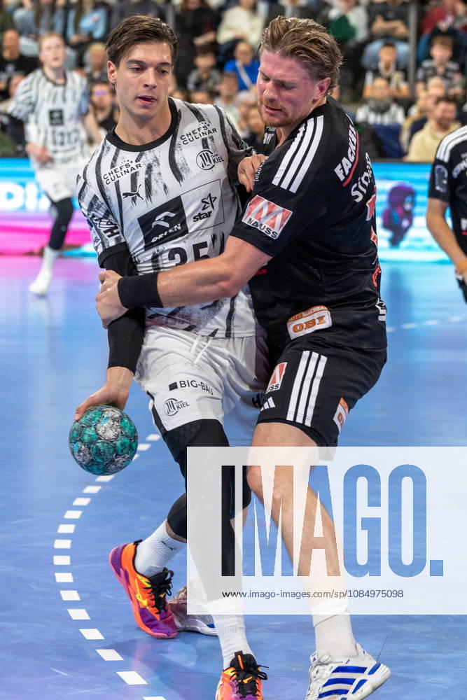 Domen Makuc (THW Kiel), 35, in a one-on-one battle with Maciej Gebala (HC Erlangen), 77 GER, HC Erlangen vs. THW Kiel, Handball, Opel Handball Bundesliga, Matchday 10, 2026–2027 season, October 24, 2026, GER, HC Erlangen vs. THW Kiel, Handball, Opel Handball Bundesliga, Matchday 10, 2026–2027 season, October 24, 2026, Nuremberg