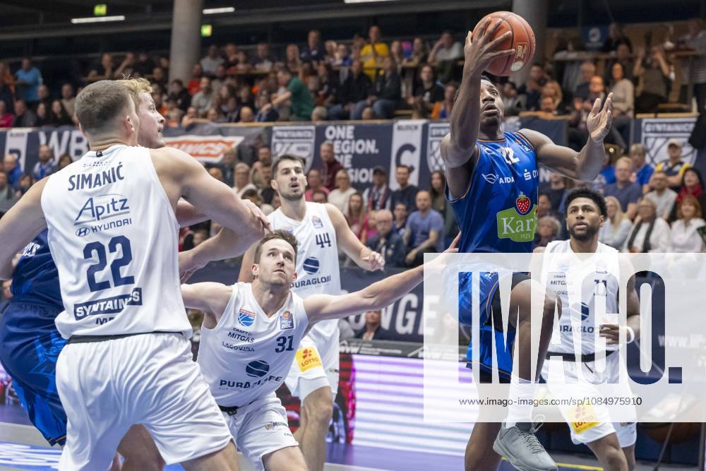 EasyCredit Basketball Bundesliga 2026–2027: Syntainics MBC vs. Rostock Seawolves, Weissenfels, Germany, October 24, 2026. Pictured from left: Borisa Simanic (Weissenfels), Spencer Reaves (Weissenfels), Jonathan Stove (Rostock), and Anthony Gaines (Weissenfels). Weissenfels Stadthalle, Weissenfels, Saxony-Anhalt, Germany