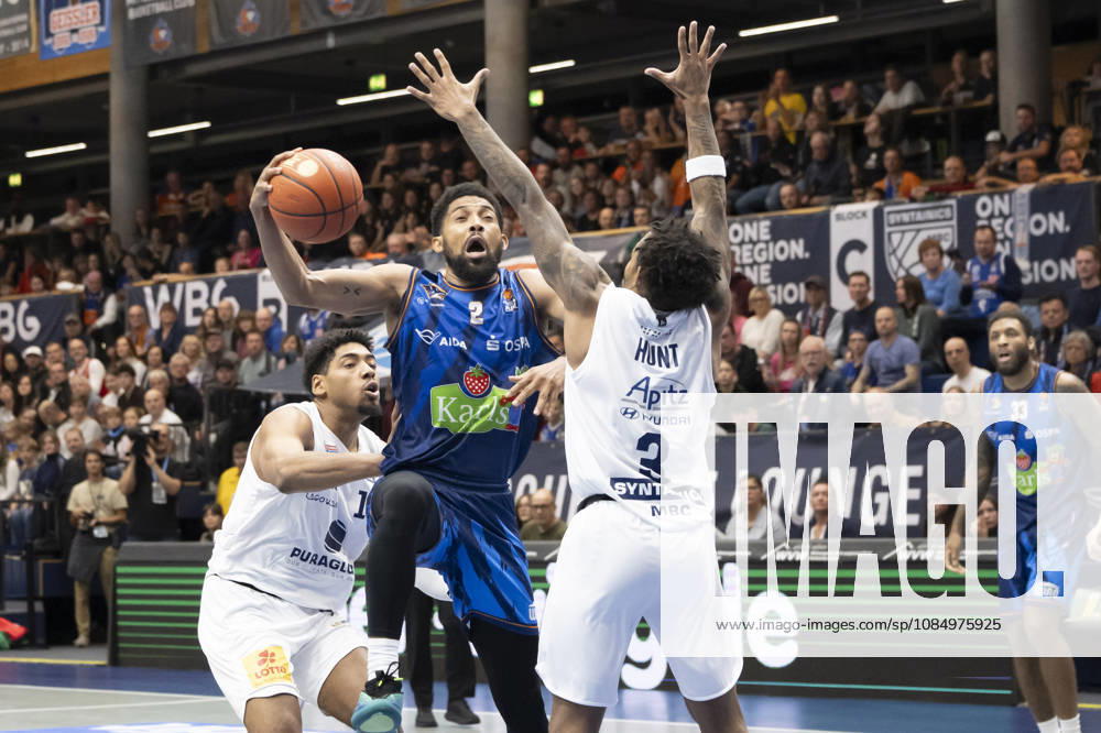 EasyCredit Basketball Bundesliga 2026–2027: Syntainics MBC vs. Rostock Seawolves, Weissenfels, Germany, October 24, 2026. Pictured, from left, in a one-on-one matchup: Kostja Mushidi (Weissenfels), Zach Copeland (Rostock), and DeLonnie Hunt (Weissenfels) at the Weissenfels Stadthalle in Weissenfels, Saxony-Anhalt, Germany
